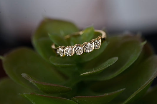 10k ring with 5 natural diamonds